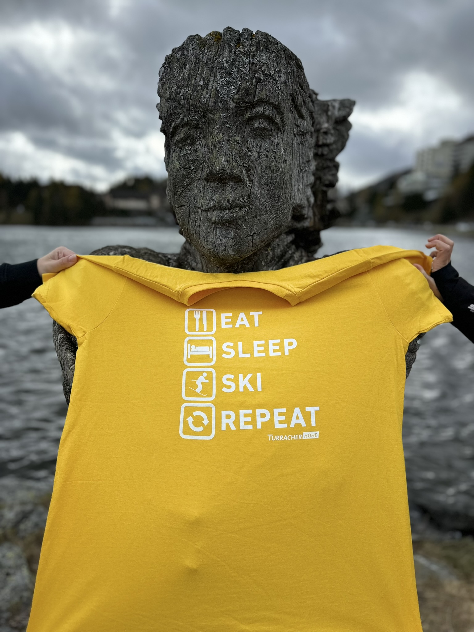 T-Shirt "Eat - Sleep - Ski - Repeat" orange